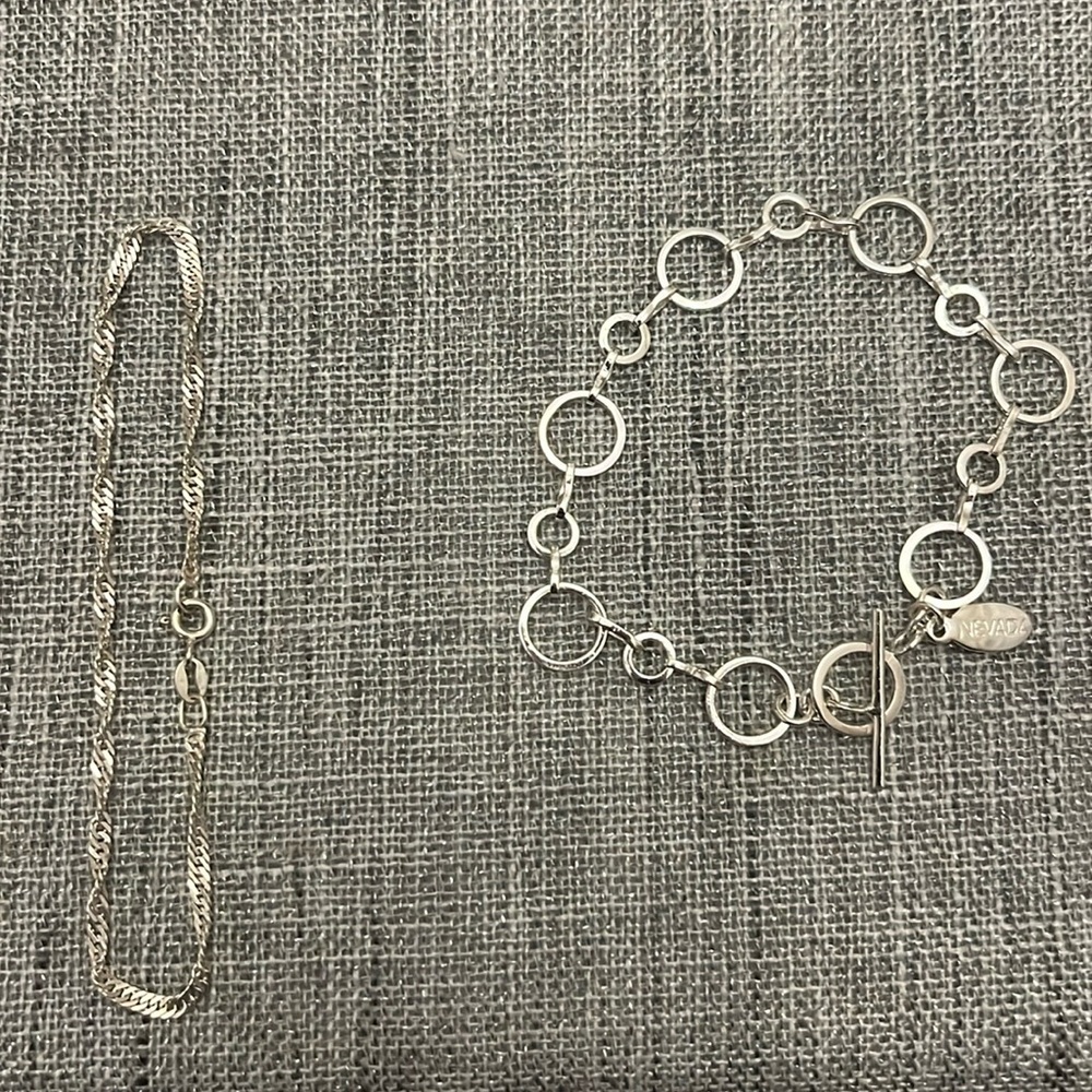 2 Sterling silver bracelets. Both stamped 925.